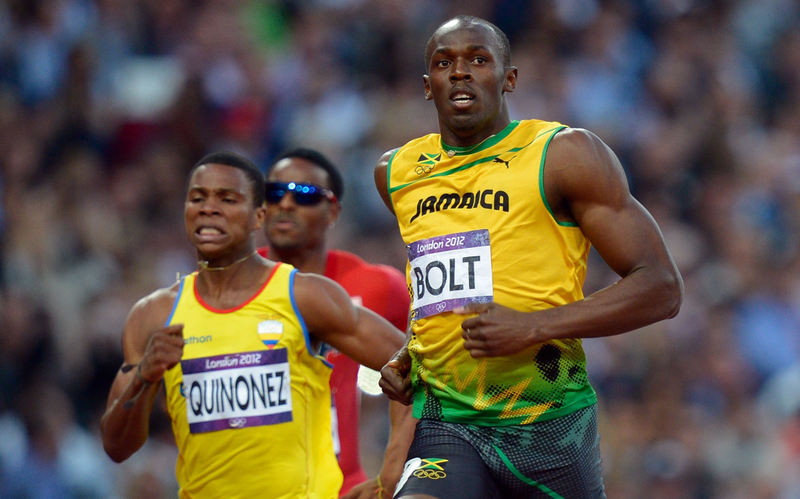 Illustration for article titled Photos Of Usain Bolt Looking Bored As He Blows Past The Best Runners In The World